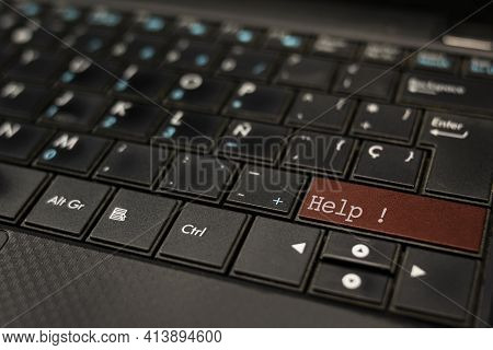 Help Concept. Help Key Embedded In A Computer Keyboard