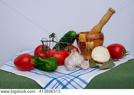 Garlic, Tomatoes, Cucumbers, Onions And Peppers, Ingredients To Make Andalusian Gazpacho.
