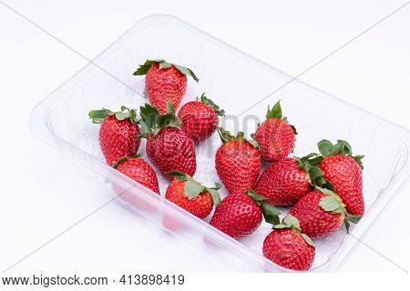 Fresh Strawberries In Plastic Punet, Ready To Be Consumed
