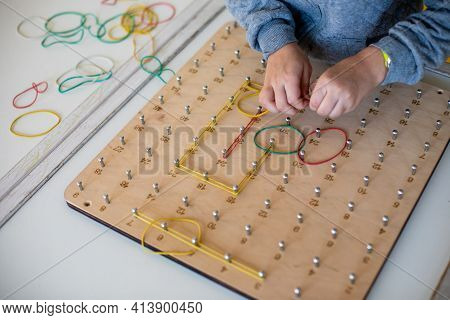 Exploring Basic Math And Geometry Concepts With Geoboard