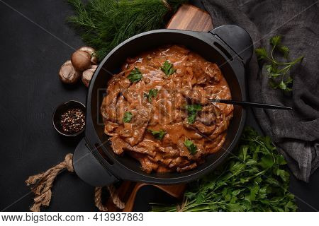 Beef Stroganoff With Cremini And Champignons On A Frying Pan.