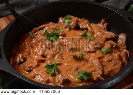 Beef Stroganoff With Cremini And Champignons On A Frying Pan.