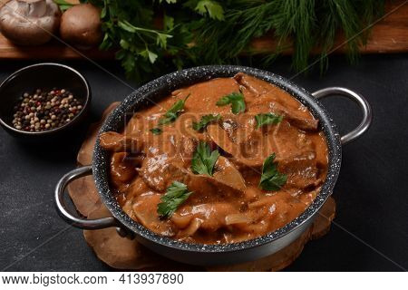 Traditional Beef Stroganoff With Cremini And Champignons In Casserole