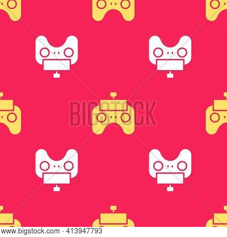 Yellow Remote Control Icon Isolated Seamless Pattern On Red Background. Vector