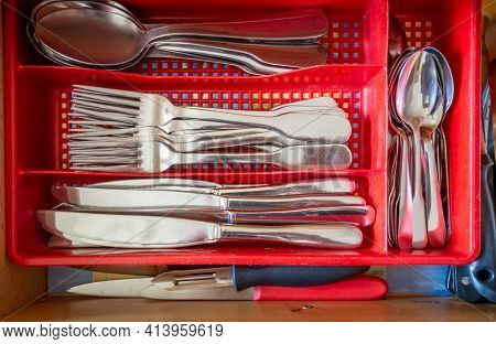 Cutlery In A Kitchen Drawer. Closeup View