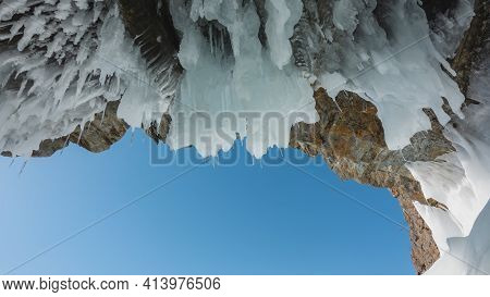 The Ceiling Of The Stone Grotto Is Covered With Bizarre Icicles That Look Like Stalactites. Close-up