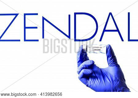 Madrid, Spain- February 23, 2021: Hand Holding Vial With Covid-19 Vaccine And Zendal Pharmaceutical 