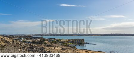Luderitz  Overlooking A Tranquil Sea In The Rugged, Rocky Terrain Of Luederitz, Namibia. Background 
