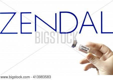 Madrid, Spain- February 23, 2021: Hand Holding Vial With Covid-19 Vaccine And Zendal Pharmaceutical 