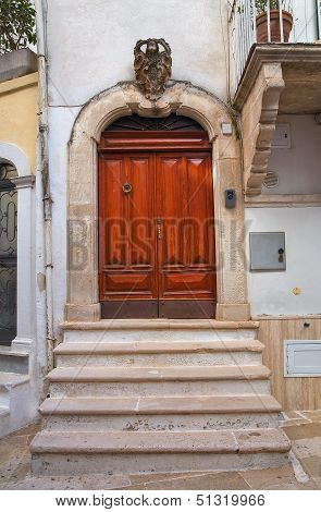 Wooden door. Noci. Puglia. Italy.