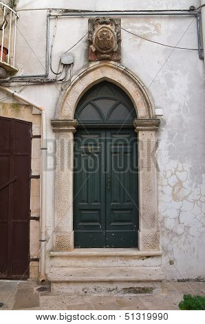 Wooden door. Noci. Puglia. Italy.