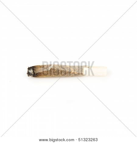 Used Cigarette Rolling Isolated Over White Background