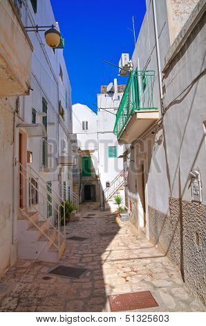Alleyway in Noci. Puglia, Italy.