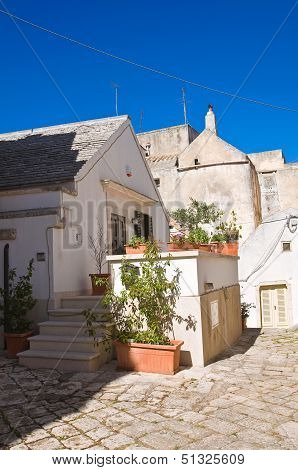 Alleyway in Noci. Puglia, Italy.