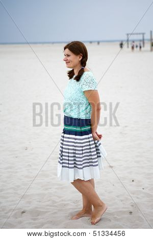 Young Happy Woman On The Beach Of St.peter Ording, North Sea,