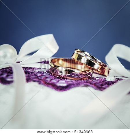 Pair Of Gold Wedding Rings With Diamond