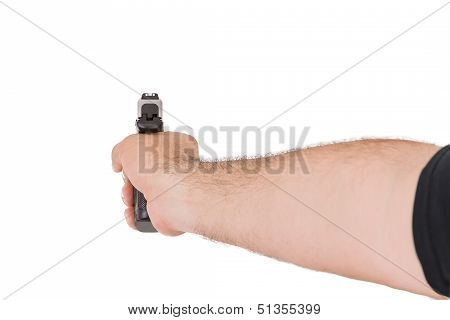 Shooting Style With Gun From Behind Of An Arm