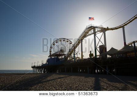 Santa Monica pier Ferris Wheel at sunset in California USA