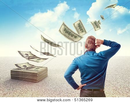 man look his money fly away