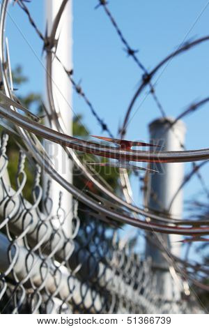 Barbwire and razor wire fence