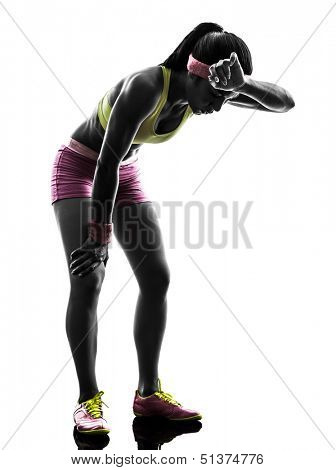 one caucasian woman runner running tired breathless  in silhouette on white background