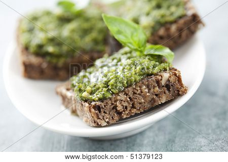 whole grain bread with fresh basil pesto