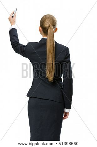 Backview of businesswoman writing on imaginative screen, isolated on white. Concept of leadership and success