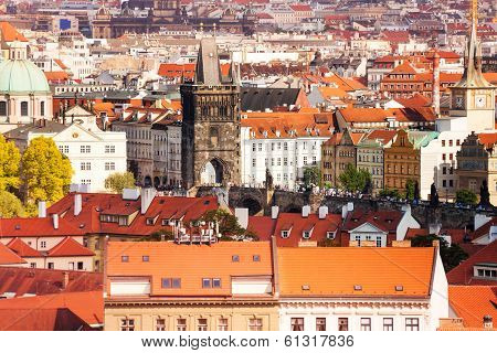 Charles Bridge And Prague Roofs