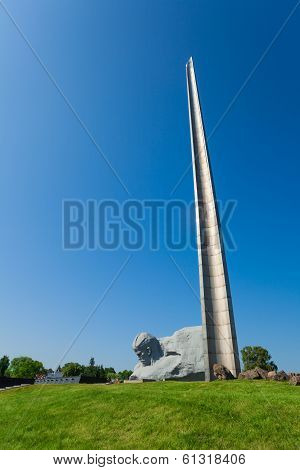 Soldier Head And Memorial Obelisk In Brest