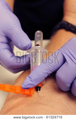 Genuine photos of a Phlebotomist aka Nurse, Doctor, or Trained Medical Professional taking Real Blood samples for analysis from a patient. Photos taken by the Patient while its happening.  