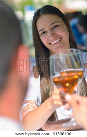 happy young couple having lanch at beautiful restaurant on the beach