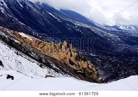 rock formation emerges along the steep walls of the 