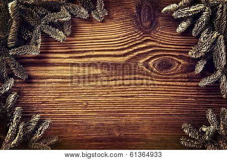 wooden board with fir branches