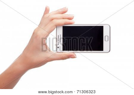 WROCLAW, POLAND - AUGUST 26, 2014: Photo of a Samsung Galaxy S2 Android smartphone