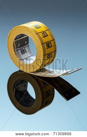 yellow tape, symbol photo for diet control and precision