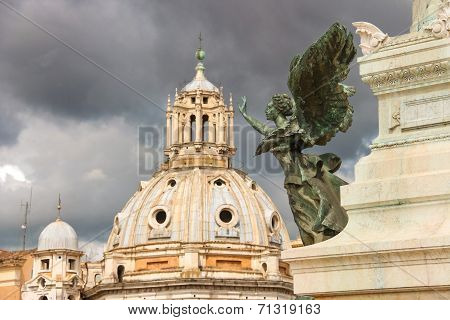 Statue Of A Winged Woman In The Monument To Victor Emmanuel Ii. Piazza Venezia, Rome