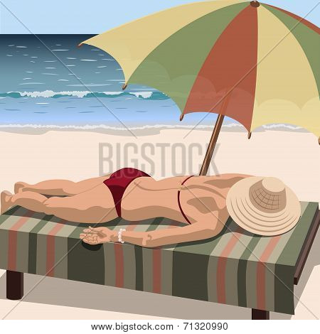 Woman sunbathes on the beach
