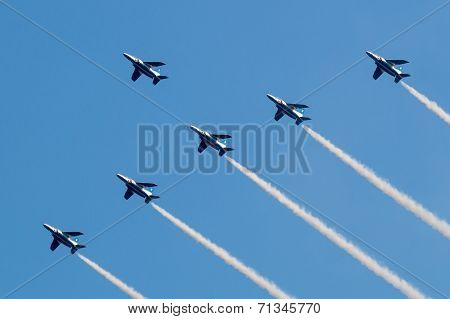 Formation flight of Blue Impulse over the Tokyo olympics stadium