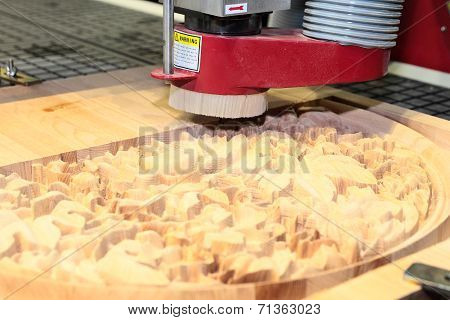 Machine is drilling wood