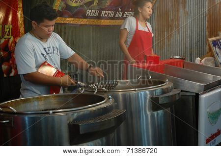Hot Temperature behind the Chestnuts Roaster
