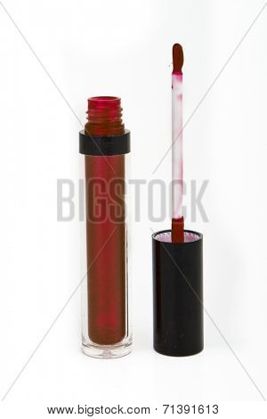 open lip glosse on white background
