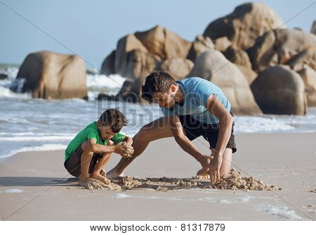 happy family on beach playing, father with son walking sea coast