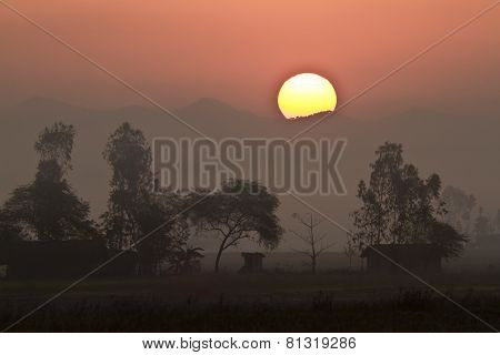wonderful sunset on a tharu village, Bardia, Nepal