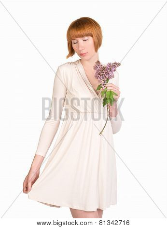 Romantic young woman in pastel dress with a lilac and modest look