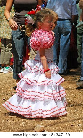 Spanish girl in flamenco dress.