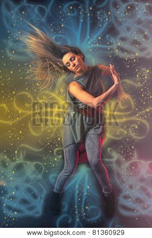 Beautiful Woman Dancer Dancing Over Dark Background With Light Rays And Star Swirls