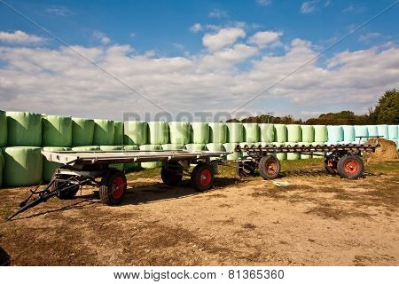 Bale Of Straw Infold In Plastic Film (foil) To Keep Dry In Automn In Intensive Colors