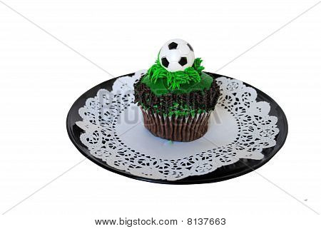 Petit gâteau, décoré avec ballon de foot