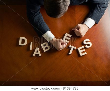 Word Diabetes and devastated man composition