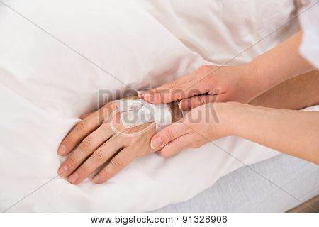 Iv Drip In Patient's Hand